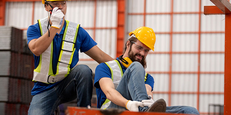 construction worker with a foot injury on site
